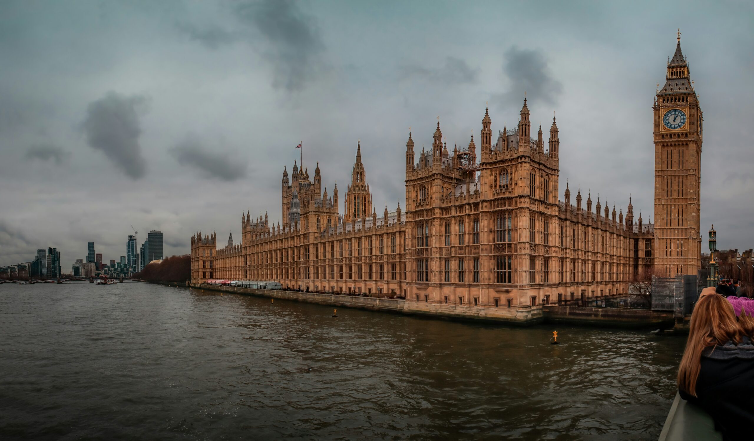 the big ben clock tower towering over the city of london